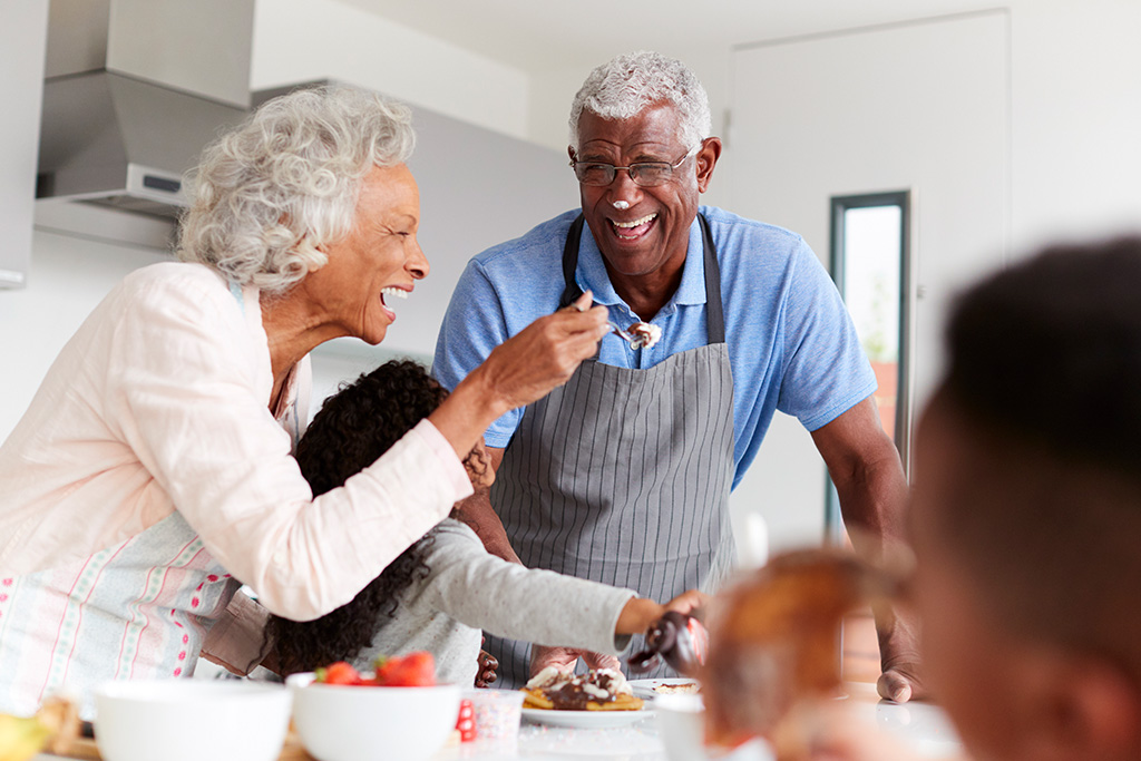 African American Senior Citizens Cooking Together